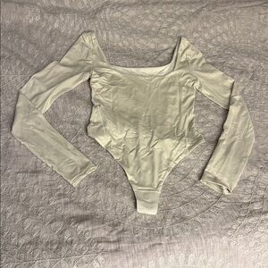 NWOT Lululemon Long Sleeve Cream gold shimmer Bodysuit